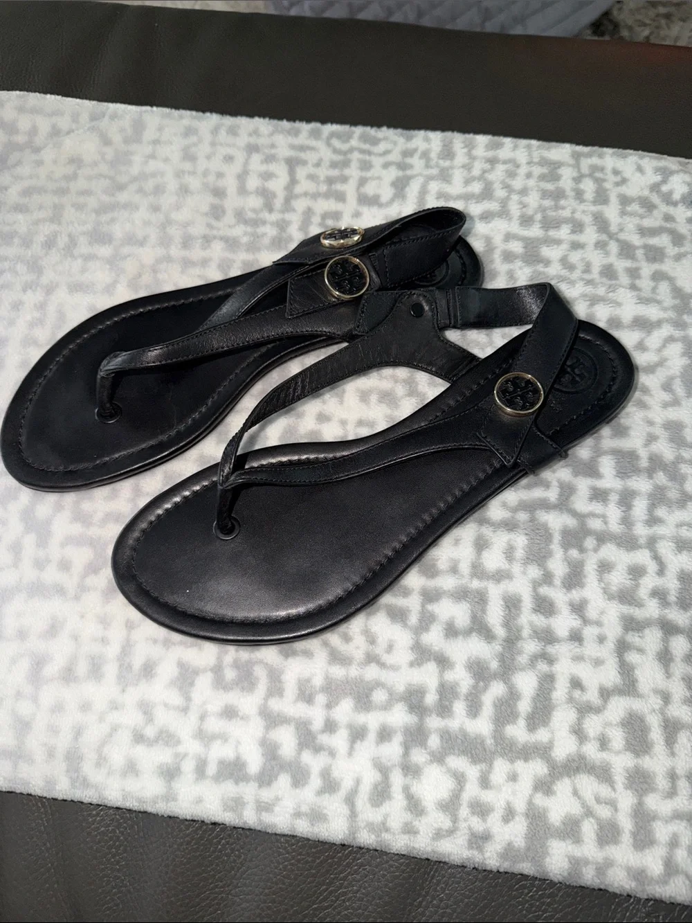Tory Burch Black Leather Minnie travel sandal with gold accent